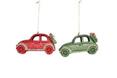 two ornaments in the shape of cars with christmas trees hanging from their backs, one red and one green