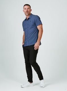 We created the perfect short sleeve button up, with the right mixture of comfort and style, just for you. Our performance shirts have 4-way stretch, are moisture wicking, wrinkle resistant and above all a great new addition to your wardrobe. The performance shirt will be your go-to for any occasion - day to night. This is a shirt that will have you satisfied at any given time. Details Model is 6'1" and wears a size medium. Care: Machine wash cold on delicate cycle with similar colors. Do not use Fitted Short Sleeve Golf Shirt, Navy Casual Tops For Business Casual, Casual Navy Tops For Golf, Fitted Casual Shirt For Business Casual, Casual Short Sleeve Shirt For Business Casual, Casual Summer Golf Shirt, Navy Business Casual Shirt, Navy Casual Shirt For Business Casual, Casual Cotton Golf Shirt