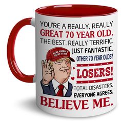 a red and white coffee mug with the words, you're really really great 70 year old