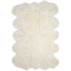 a white sheepskin rug on a white background