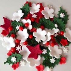 a christmas wreath with candy canes and decorations