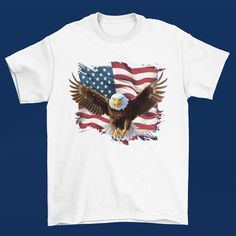 an american flag and bald eagle on a white t - shirt against a blue background