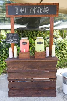 a lemonade stand with drinks on it