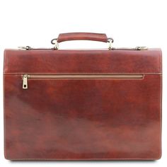 Experience the elegance of a true Italian leather briefcase. Handcrafted with precision by skilled artisans in Tuscany, this briefcase embodies the essence of Italian craftsmanship. Made from 100% full-grain leather, it merges luxury and functionality seamlessly. Ideal for professionals, its semi-rigid structure and three compartments ensure ample space for documents, a laptop, and other essentials. Featuring antique brass or nickel hardware, this italian leather briefcase is built to last. The Luxury Leather-lined Satchel Briefcase, Italian Leather Briefcase For Formal Use, Elegant Cognac Briefcase With Smooth Grain, Timeless Top Handle Briefcase For Formal Use, Timeless Formal Briefcase With Top Handle, Elegant Formal Cognac Briefcase, Brown Professional Satchel For Formal Use, Formal Rectangular Cognac Laptop Bag, Luxury Satchel Briefcase For Formal Occasions