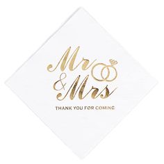 a white napkin with gold foil lettering that says,'mr and mrs thank you for coming