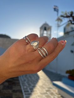 Introducing our stunning collection of silver rings, designed and handmade by the skilled artisans of Christina Christi in Greece. Each ring is crafted from basic metal, giving it a sleek and modern look that is perfect for any occasion. Each of our rings is handcrafted with a passion for quality and excellence, and is only available in our store, Christina Christi. We take pride in our designs and the attention to detail that goes into each piece. Make a statement with our versatile silver ring Fine Jewelry Sterling Silver Heart Ring With Polished Finish, Sterling Silver Heart Ring With Polished Finish, Silver Heart Ring With Polished Finish For Wedding, Silver Stackable Heart Shaped Rings, Silver Heart Shaped Stackable Rings, Adjustable Silver Heart Ring Fine Jewelry, Silver Stackable Heart Ring For Wedding, Artisan Sterling Silver Ring With Polished Finish, White Open Band Rings With Polished Finish