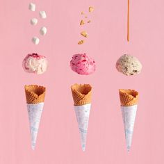 three ice cream cones with sprinkles and marshmallows