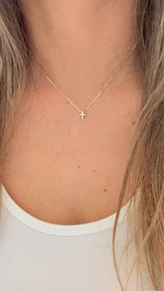 "Ensure lasting memories for the special moments in your life with this 14K gold tiny cross necklace, a religious jewelry gift. Crafted for women of Christian faith, this small cross pendant is bold and designed in a 3D mini cross configuration. Free shipping offered. This piece is beautiful, elegant, shiny, and suitably sturdy for a baptismal gift. ⁙ Materials: 14K Yellow Gold ⁙ Dimensions: 8MM Height by 6MM Width in diameter, the chain is very sturdy and 1MM wide, it is 16\"-18\"  it can be hooked at either or length  Production Times: ⁙ Order processing time varies between 1-5 business days ⁙ All orders placed on Saturday, Sunday, or on a national holiday will begin processing the following business day" Tiny Cross Necklace, Dainty Cross Necklace, Cross Gift, Tiny Cross, Mini Cross, Gold Cross Necklace, Diamond Cross Pendants, Tiny Diamond, Shades Of Gold