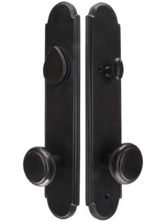 two black door handles with knobs on them