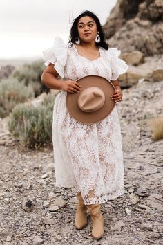 Embrace the charm of autumn in the Hattie Dress in White Lace. This enchanting dress features a round neckline, short flutter sleeves, and a smocked bodice for effortless elegance. The midi-length skirt adds a touch of sophistication, making it the perfect dress for your seasonal gatherings. (plus did we mention she's maternity-friendly?!) *we recommend sizing down 1-2 sizes due to the stretch of the dress Hattie Dress, Enchanting Dress, White Bridal Dresses, City Woman, White Dress Party, Wardrobe Inspiration, Girls Dresses Summer, Midi Length Skirts, Mom Dress