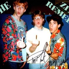 three young men standing next to each other in front of a blue wall with the words, the zat remedy on it