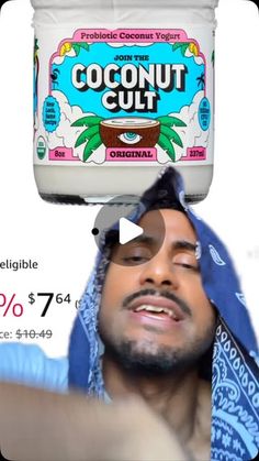 a man with sunglasses and a towel on his head is looking at a jar of coconut oil