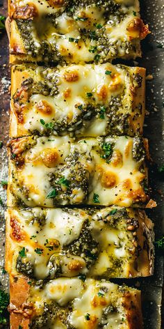 four slices of pizza covered in cheese and spinach