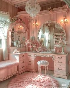 a bedroom with pink furniture and chandelier in the corner is decorated like a princess's room