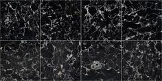 four black marble tiles with different patterns