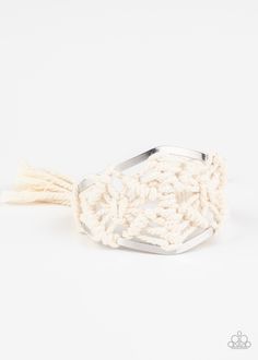 White cording decoratively knots and weaves around an airy silver cuff for a macramé inspired look. Knotted around the ends, white tassels flair out from bottoms of the cuff for a wanderlust finish.

Sold as one individual bracelet. Silver Link Necklace, White Bracelet, White Tassel, White Bracelets, Life Of The Party, Paparazzi Accessories, White Rhinestone, Paparazzi Jewelry, Design Silver