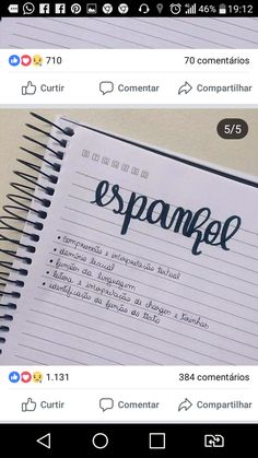 an open notebook with spanish words on it