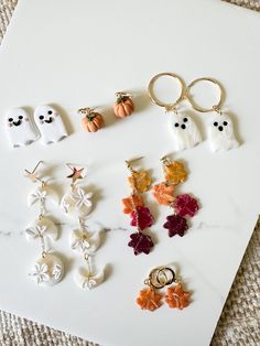 These handmade HALLOWEEN polymer clay earrings are light and the perfect accessory for your ears! Each style is different and all are Halloween or fall themed. The attached pieces are either Cubic Zirconia or gold plated. Earring posts/hooks are all hypoallergenic and nickle/lead free! if any styles that you want are sold out/unavailable, please message me! I can create more! please also message if you are interested in silver options!  All fall styles are made to order. Fall Clay Earrings Diy, Halloween Polymer Clay Earrings, Halloween Clay Earrings, Halloween Polymer Clay, Easy Crafts To Sell, Halloween Clay, Ghost Earrings, Fall Styles, Pumpkin Earrings