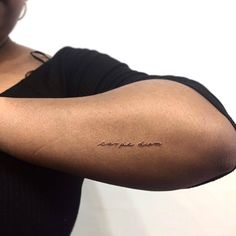 a woman's arm with the word carpia written in cursive writing