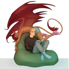 a man sitting on top of a green chair next to a dragon and a cat