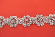 This beautiful trim is made of high-quality clear rhinestones. It is perfect for all special occasions. It can be used for wedding dress, wedding belts and sashes, bridesmaid sashes and belts hats, headbands, headpieces, flower bouquet wrap, wedding invitation, gowns, hair accessory, sash craft, jewelry, cake decoration, bags, scrapbook or any other decorations. Applying Method: Sew on, Glue on Color: SIlver Gold Size: Width: 1 1/2Inches approx. Length: 36: inches Please contact us for wholesale Elegant Silver Bedazzled Sash, Elegant Silver Bedazzled Sashes, Elegant Bedazzled Silver Sash, Elegant Bedazzled Silver Sashes, Elegant Bedazzled Silver Bridal Accessories, Elegant Silver Bedazzled Bridal Accessories, Elegant Bedazzled Bridal Belt For Wedding, Elegant Silver Belt With Rhinestones, Elegant Bedazzled Wedding Sash