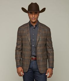 The Lucchese Sport Coat offers instant Western refinement to the cowboy's repertoire. Fashioned from rich Italian wool and silk, the Lucchese Sport Coat ensures a relaxed fit, suitable for layering. Accompanied by a barchetta chest pocket and two jetted flap pockets, this versatile sport coat will burnish a cowboys look and confidence. Model is 6'1.5 and wearing size 42R. Brown Fitted Blazer With Concealed Placket, Fitted Brown Blazer With Concealed Placket, Custom Fit Brown Blazer For Work, Custom Fit Single Breasted Brown Blazer, Classic Fall Outerwear For Rodeo, Western Brown Outerwear For Work, Fitted Western Brown Outerwear, Fitted Brown Western Outerwear, Western Brown Rodeo Outerwear