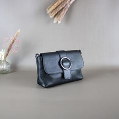 "Our leather women's bags are made from high-quality leather in Italy. They are available in various styles and sizes to suit every occasion. Our bags are durable and stylish, and will bring you joy for many years. Our bags are perfect as gifts for women. ⭐ High-Quality Women's Leather Bags: Our exclusive collections offer stylish and durable leather bags for women. ⭐ Genuine Leather from Italy: Our bags are handcrafted from high-quality Italian leather, providing a luxurious carrying experience Leather Crossbody Clutch With Phone Bag, Leather Crossbody Clutch With Mobile Phone Bag, Leather Belt Bag For Daily Use, Trendy Leather Clutch Mobile Phone Bag, Leather Office Bag With Cell Phone Pocket, Trendy Leather Mobile Phone Clutch, Trendy Leather Clutch For Mobile Phone, Modern Leather Clutch With Mobile Phone Bag, Office Leather Bag With Cell Phone Pocket