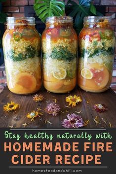 three mason jars filled with homemade fire cider recipe