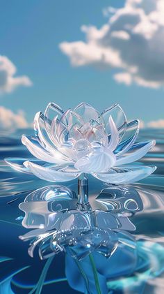 a large white flower floating on top of water next to a cloud filled blue sky