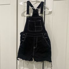 Black, Short Overalls With White Stitching!! Material Is Stretchy And Super Comfy. They Have Adjustable Straps And The The Shorts Were Cut At The Bottom For A Better Fit. They Were Thrifted New With Tags, But Has Been Worn Only Once Or Twice. Fits A Small- Medium. Super Cute For The Spring And I Am Willing To Negotiate Prices!! #Overalls #Princesspolly #Spring #Fall #Americanbazi Black High Waist Cotton Jumpsuits And Rompers, Black High-waist Cotton Jumpsuits And Rompers, High Rise Black Overalls For Spring, Trendy Sleeveless Black Overalls, Casual Black High-rise Jumpsuits And Rompers, Black Overalls Shorts, Black Short Overalls, Overall Shorts Outfit, Drawing Outfits