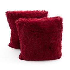 two red pillows sitting on top of each other