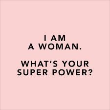 the words i am a woman, what's your super power? on a pink background