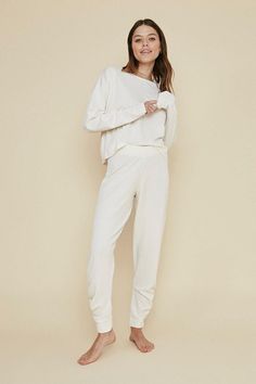 It’s time to take on a more laidback approach and invest in some luxurious lounge pieces, so you can relax in pure comfort. Whether you’re working from home or simply working your way through Netflix; our super stylish loungewear collection is here to elevate your lounging looks. We’re talking matching velvet lounge sets, cosy joggers, empowering slogan jumpers, bold animal prints, embellished detailing, and everything else that’ll carry you from AM to PM (without having to change). Moving from the bedroom to the living room? Style chic satin pyjamas with fluffy mule slippers and a knitted, longline cardigan for the ultimate off-duty ensemble. Or wrap up warm in an oversized hoody, high-waisted joggers, and chunky trainers. Obligatory bottle of wine not included. Luxurious Lounge, Match Velvet, Satin Pyjamas, Stylish Loungewear, Velvet Lounge, Am To Pm, Chunky Trainers, Longline Cardigan, Oasis Fashion