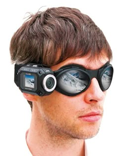 a man with goggles on looking at the camera