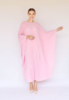 "A special collection with pleated kaftan in fan-style will bring the best \"new\" look for any occasions you may attend. Classic but chic !. It's totally smoothly flowy, soft and gentle touch. FEATURES - Light Pink  - Pleated - Personal Custom Made - Full Length Kaftan  - Designer Silk Kaftan - Plus Size and Custom Length - Resort Wear, Beach Wear, Lounge Wear, Pool Cover Up Kaftan - Boat Neck -------------------------------- DETAIL  * The maximum length : 134 CM ( please be noted, this can not Pink Pleated Vacation Dress, Pink Pleated Beach Dress, Pink Pleated Maxi Dress For Vacation, Elegant Pink Kaftan For Beach Cover-up, Elegant Pink Beach Cover-up Dress, Elegant Pink Dress For Beach Cover-up, Flowy Pleated Pink Maxi Dress, Flowy Pink Pleated Maxi Dress, Flowy Pink Dress For Loungewear