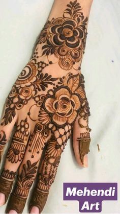 the hand is decorated with hendi art