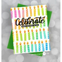 a birthday card with candles on it and the words celebrate written in cursive writing