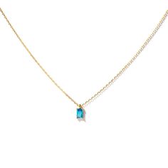 A dainty stone and delicate metallic chain are combined to create this Gold Pendant Necklace in bright aquamarine, your new favorite wear-anywhere accessory. Aquamarine is the birthstone of March. 14k gold plated over sterling silverH2O sensitive. Before showering or working out, remove your plated jewelry. Clean your piece by buffing gently with a dry cloth and store it in your pouch.High quality lab created emerald stone Petite Necklace, September Birthstone Jewelry, August Birthstone Jewelry, July Birthstone Jewelry, 14k Gold Necklace, Jewelry Ring Box, Pearl Jewellery Earrings, Emerald Stone, Evil Eye Jewelry