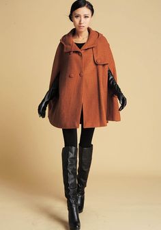 "How gorgeous is this classic brown cape with hooded, hip pockets . It's long enough to reach the back of the hand, keeping you warm but keeping your hands available when needed as a winter cape, but also a perfect option when pregnant. Made from soft wool fabric, the short cape is completely lined in polyester with fabulous flap detailing on the front, shoulders, pockets and back. This is a cape coat you will wear forever. **Detail * More color optional https://etsy.me/3AwTfvZ * 50% wool blend, Winter Minimalist Wardrobe, Brown Cape, Women Cape, Cape With Hood, Winter Cape, Cape For Women, Wool Cape Coat, Orange Coat, Tailored Clothes