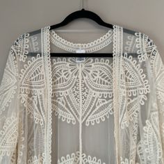 Time And Tru Lace Kimono. 63% Cotton, 37% Nylon. Spring White Lace Outerwear, White Lace Outerwear For Spring, Cream Open Front Outerwear For Beach, Cream Open Front Outerwear For The Beach, Cream Open Front Outerwear For Summer, Cream Summer Outerwear For Day Out, Spring Lace Outerwear With Open Front, Bohemian Open Front Outerwear For Brunch, Cream Bohemian Outerwear For Summer