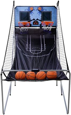 an inflatable basketball game with three balls on the floor and two monitors above it