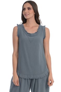 Cotton gauze frayed tank top in gray. Scoop neckline. Rounded hemline. Triangular appliqué at front collar. Frayed edges at collar, armscyes, and hem. Tonal stitching. Supplier color: Gray. 100% cotton. Made in Mexico. Scoop Neckline, Stitching, Tank Top, New York, Tank Tops, Collar, Color, Cross Stitching, Mexico