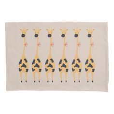 four giraffes are standing in a row on a white background with black spots