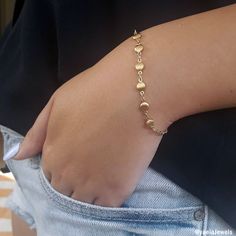 Beautiful dainty bracelet, this tiny coin bracelet is made with a dainty, yet durable, 18k gold plated coins and chain and it's perfect for layering with other chain bracelets or bangle bracelets (sold separately). ✤Small coin chain - 18K high-quality Gold plated Total length: 6//6.5//7//7.5//8 inches with an extension of 1.5 inches ✤If you need a different size please send me a message. Feel free to contact me for details & options. ♥All items are packed in an elegant jewelry box and ready Round Gold Bracelet Made Of Brass, Dainty Brass Bracelet For Gift, Dainty Brass Bracelet As Gift, Dainty Brass Bracelet For Gifts, Adjustable Gold Plated Dainty Chain Bracelet, Brass Bracelets With Adjustable Chain, Brass Bracelet With Adjustable Chain, Dainty Brass Bracelet Jewelry, Dainty Gold Bracelet With Delicate Chain