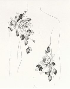 the back of a woman's body with flowers on it