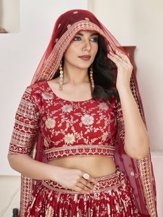 Introducing our stunning "glamorous red zari embroidered jacquard wedding lehenga choli" that is sure to make you stand out at any wedding or special occasion. This exquisite ensemble features a red color jacquard lehenga with intricate zari embroidered work and sequin work, paired with a matching jacquard choli and net dupatta. The lehenga is semi-stitched up to 42 inches, allowing for a perfect fit, while the choli comes as unstitched material for customization. The net dupatta with four side Fitted Meenakari Lehenga For Traditional Ceremonies, Red Semi-stitched Kundan Sets, Red Semi-stitched Sets With Intricate Embroidery, Red Banarasi Silk Lehenga With Intricate Embroidery, Red Semi-stitched Lehenga With Unstitched Blouse, Banarasi Silk Choli With Intricate Embroidery For Traditional Ceremonies, Red Art Silk Anarkali Set For Wedding, Festive Red Lehenga With Pallu, Festive Lehenga With Unstitched Blouse For Traditional Ceremonies