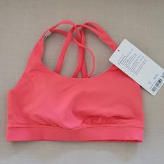 Brand New. I Cut Tag Before Trying On And Then It Didn't Fit. Lululemon Sports Bra. Color Is Like A Coral. Size 4 Lululemon Poshmark, Lululemon Wishlist, Cheer Fits, Lulu Lemon Sports Bra, Camp Outfits, Running Outfits, Cute Summer Shirts