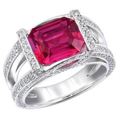 Discover the exceptional beauty of this 14K white gold ring, featuring a breathtaking natural pink sapphire surrounded by brilliant diamonds. The vivid purplish-pink hue of the sapphire, paired with the radiant diamonds, creates a stunning and sophisticated piece that exudes luxury. Center Stone: Natural Pink Sapphire Quantity & Weight: The centerpiece of this ring is a single pink sapphire weighing an impressive 3.22 carats. Color: A vivid purplish-pink, a rare and enchanting color that adds a Sapphire Side Stones, White Gold Sapphire Ring, White Sapphire Ring, Pink Sapphire Ring, Natural Gemstone Ring, 14k White Gold Ring, Sapphire Stone, White Gold Ring, Brilliant Diamond