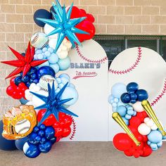 balloons are arranged in the shape of baseballs and stars