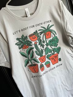 "Let's Root for Each Other and Watch Each Other Grow design made on Bella Canvas shirt. Shown on a \"silver\" tee. Message me if you have any questions!" Graphic Tees Teacher, Cute Tshirt Designs Graphic Tees, T Shirt Ideas For Women, Cute Shirts Aesthetic, T-shirt Designs, Cute T Shirt Designs, Plant Shirts, Etsy Shirts, Surfergirl Style